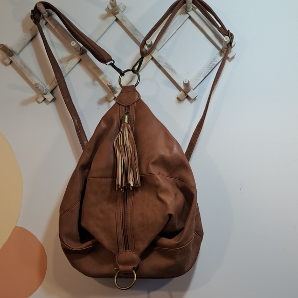 Fiorelli Handbags - Tassel Accent Tan Leather Sling Backpack